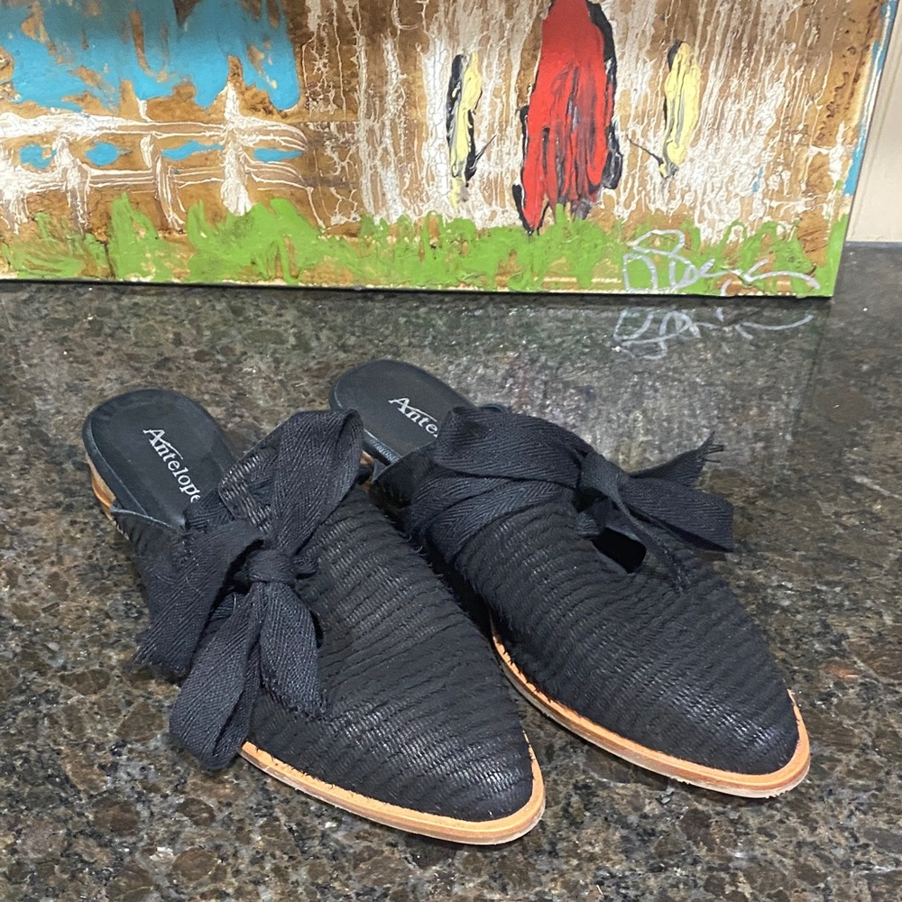 Antelope Black Textured Mules with Bow. Worn twice. Size 10. Great condition.